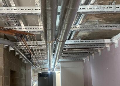 Multi-service bracketry for a hospital M&E renovation